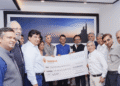 NAREDCO Maharashtra President Prashant Sharma presents ₹3.12 crore donation cheque to CM Relief Fund team, supporting flood-affected farmers in Maharashtra