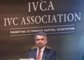 Prem Prabhakar addressing investors and climate-tech leaders at the IVCA GreenReturns Summit 2025 in New Delhi with the audience and summit backdrop visible behind him