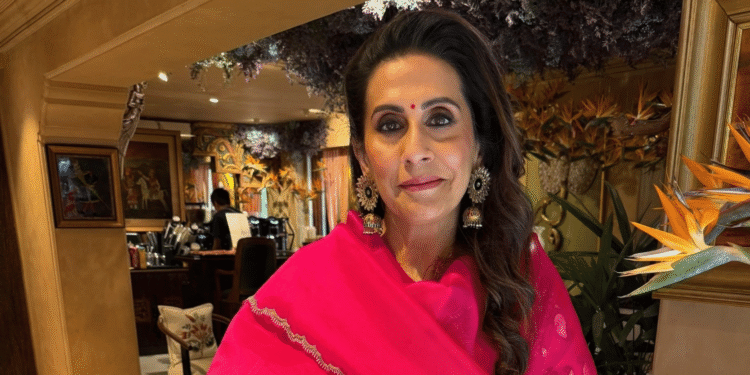 Sunita Kapoor Chooses Divya Sheth’s Fuchsia Pink Organza Silk Ensemble for Festive Appearance