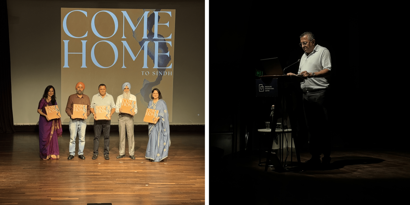 Six people on a stage hold orange books in front of a large 'COME HOME' banner, posing for a photo on a wooden floor. On the right, a man stands at a podium with a laptop in a dark auditorium.